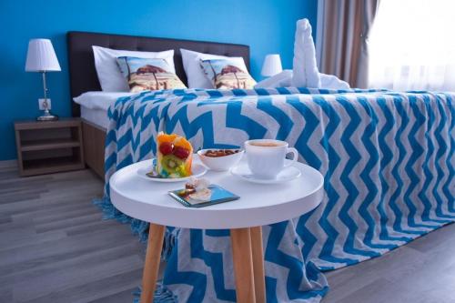 מיטה או מיטות בחדר ב-Summerland Sea & Lake