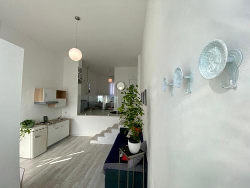 Postel nebo postele na pokoji v ubytování Scalabrini LOFT