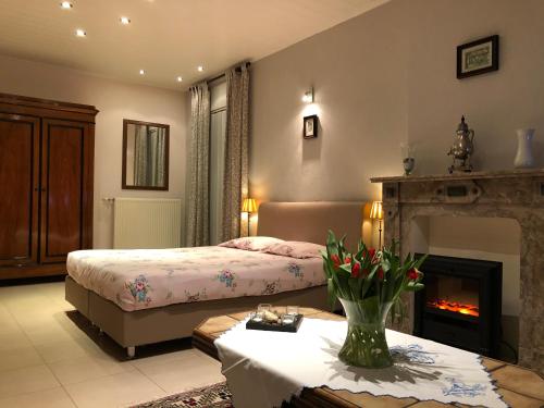 Ένα ή περισσότερα κρεβάτια σε δωμάτιο στο Hoeve de Singel