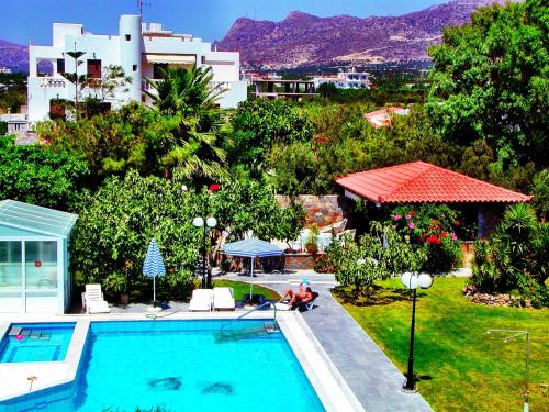 a view of a swimming pool in a house at Irene Villa in Ierápetra
