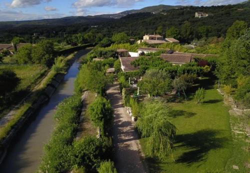 an aerial view of a river in a village at Gîte chez Cécile dans le Luberon in Lagnes