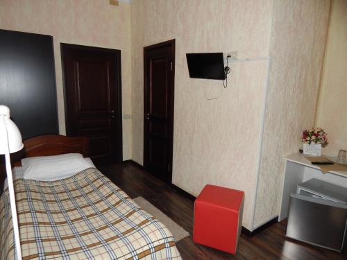 Кровать или кровати в номере Hotel 1812