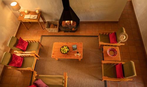 an overhead view of a living room with a table and chairs at Mount Ceder in Cederberg