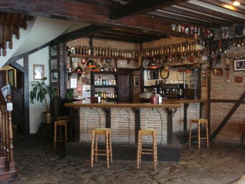 Ο χώρος του lounge ή του μπαρ στο Hotel Kenia Nevada