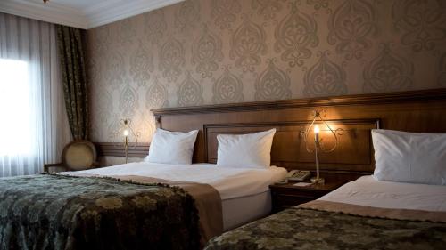 Postel nebo postele na pokoji v ubytování Ferman Hotel Old City -Special Category