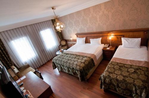 Postel nebo postele na pokoji v ubytování Ferman Hotel Old City -Special Category