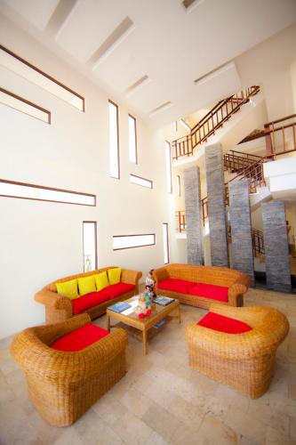 Area soggiorno di Hotel Isla Sol by Solymar