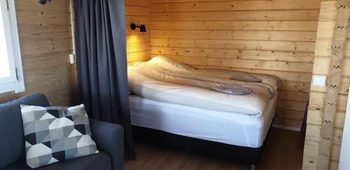 En eller flere senge i et værelse på Hvammur 4 with private hot tub (Fagurgali)