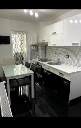 Η κουζίνα ή μικρή κουζίνα στο Apartament Nicolas