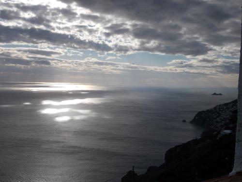 a view of the ocean under a cloudy sky at Casa Barbara in Amalfi