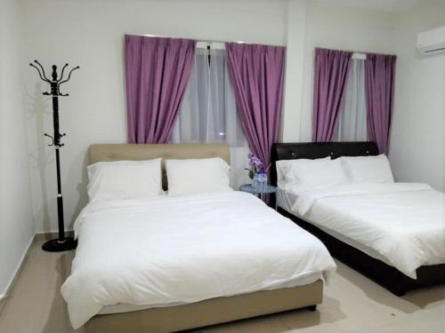 Postel nebo postele na pokoji v ubytování iG Hotel