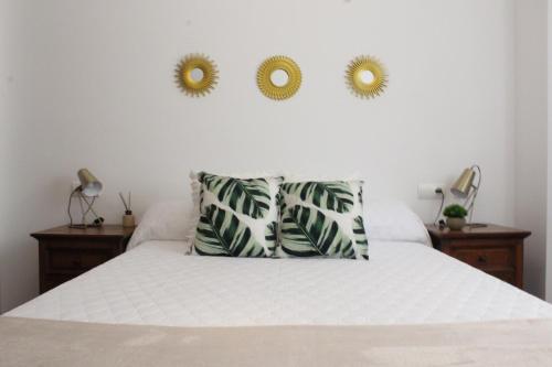Posteľ alebo postele v izbe v ubytovaní Apartamento centro paseo maritimo