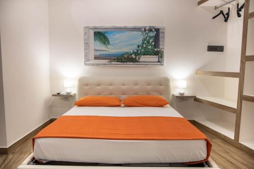 Säng eller sängar i ett rum på Beltrani Rent Rooms