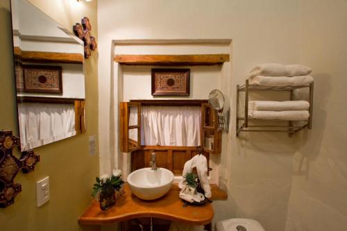 Ванная комната в La Casa del Naranjo Hotel Boutique