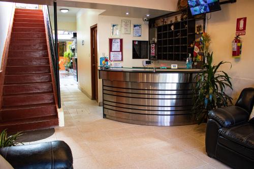 TV a/nebo společenská místnost v ubytování Hotel Los Laureles
