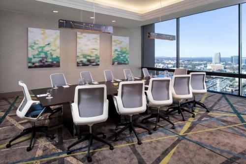 a conference room with a long table and chairs at Staybridge Suites Atlanta - Midtown by IHG in Atlanta