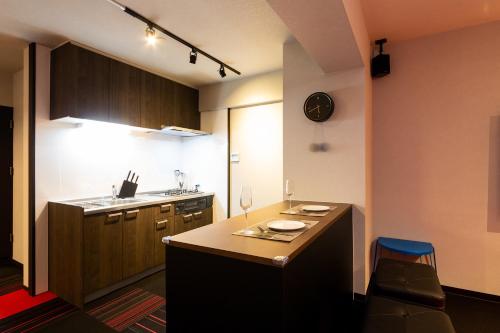 Una cocina o zona de cocina en Stay Hakata