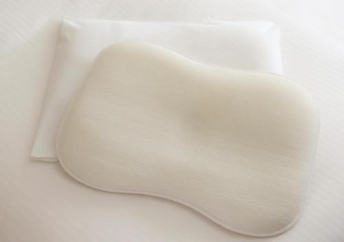 a white chair sitting on top of a table at APA Hotel Ueno Ekimae in Tokyo