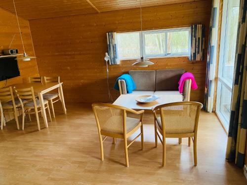 TV a/nebo společenská místnost v ubytování Hummingen camping hus 3