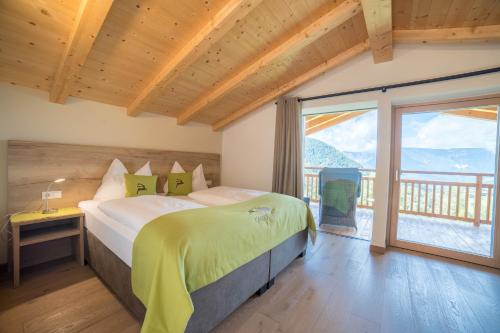 Postel nebo postele na pokoji v ubytování Gasserhof - Chalet A