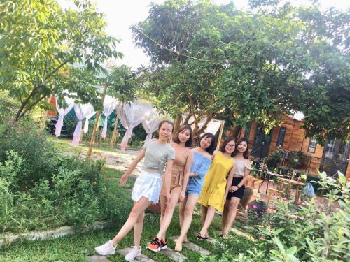 a group of people posing for a picture at Cô Tô Homestay 368 in Chung Cap