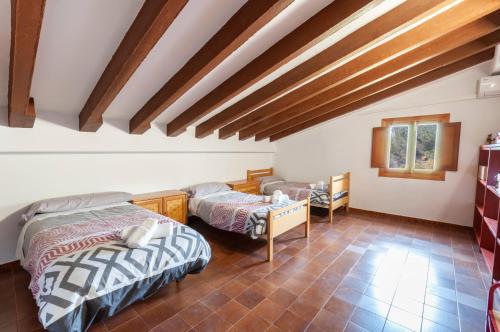 מיטה או מיטות בחדר ב-La Solana