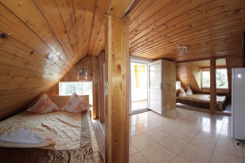 Postel nebo postele na pokoji v ubytování Casa Francisc