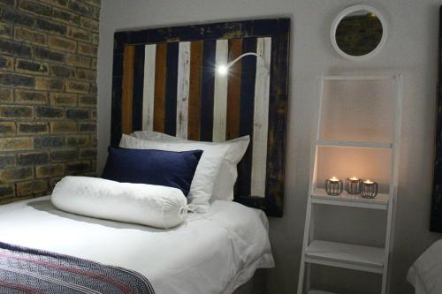 Ein Bett oder Betten in einem Zimmer der Unterkunft Kleinmond - Fairview on First