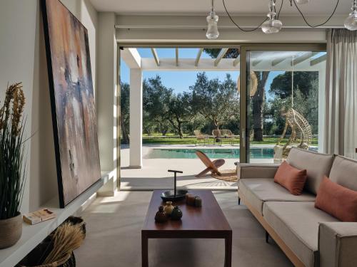 Гостиная зона в Oceanids Luxury Villas, By ThinkVilla