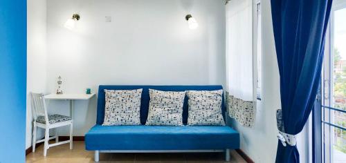 Χώρος καθιστικού στο Rainbow Guest House