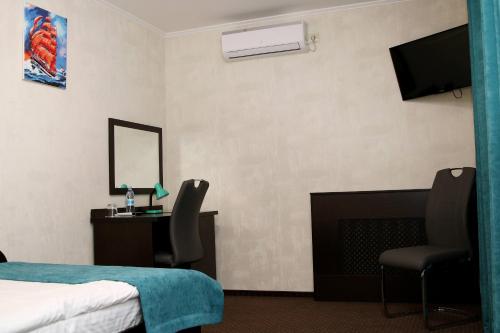 Una cama o camas en una habitación de Hotel Tourist