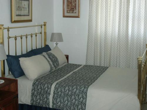 Кровать или кровати в номере Casa Bianco