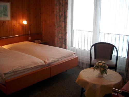 Postel nebo postele na pokoji v ubytování Hotel Restaurant Cristal