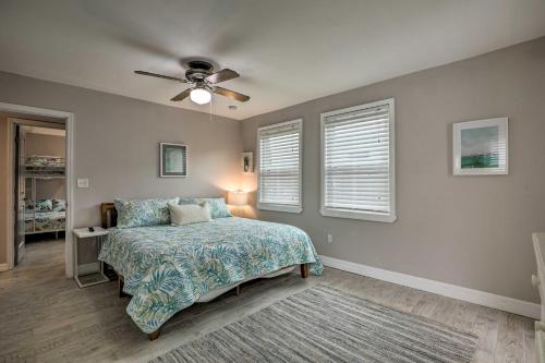 a bedroom with a bed and a ceiling fan at St Augustine Home with Private Pool 4 Mi to Beach! in Saint Augustine