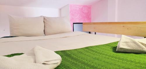 Cama o camas de una habitación en Kukul'ik Studios & Workspace