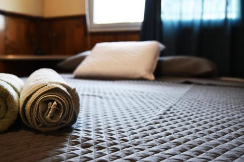 Voodi või voodid majutusasutuse Hotel Manantiales El Salvador toas