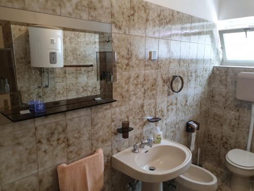 Kúpeľňa v ubytovaní Apartment in Jadranovo 41613