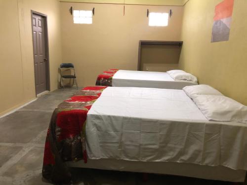 Postel nebo postele na pokoji v ubytování Hotel Casa Vieja