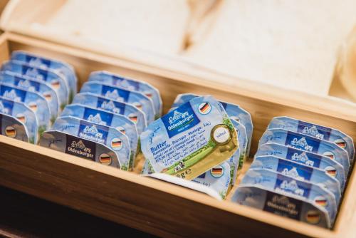 a display of blue and white toilet paper on a shelf at Hej Taipei in Taipei