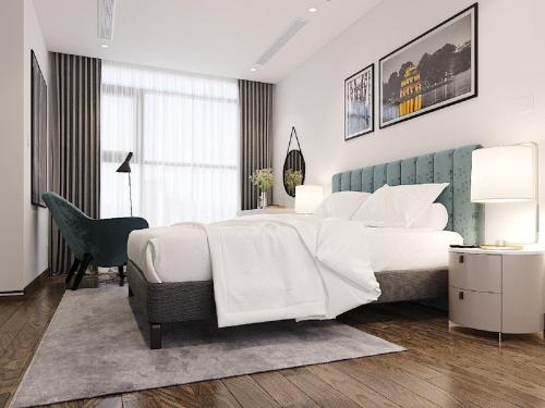 Cama o camas de una habitación en Aspaces Serviced Apartments - Vinhomes West Point