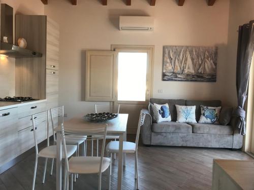Una cocina o zona de cocina en Residenza Limpiddu