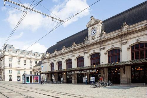 a large building with a clock tower on top of it at ibis budget Bordeaux Centre Mériadeck in Bordeaux