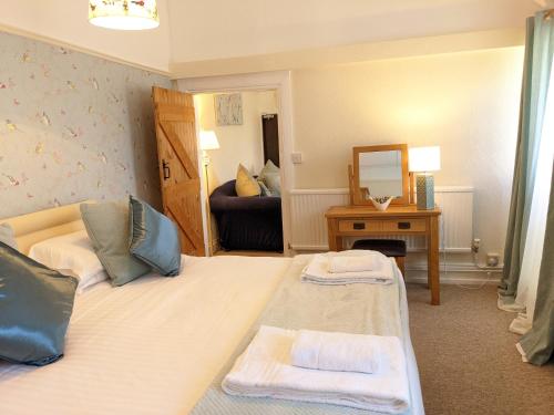 Un ou plusieurs lits dans un hébergement de l'établissement Sparkford Inn