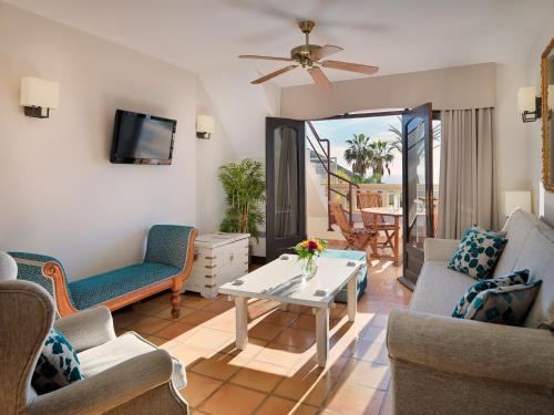 Χώρος καθιστικού στο Regency Country Club, Apartments Suites