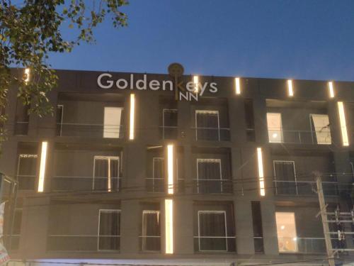 a building with a sign on the side of it at GoldenKeys Inn in New Delhi