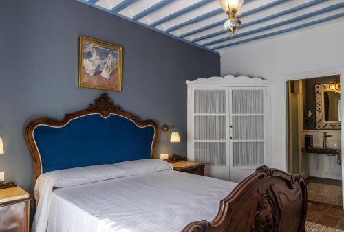 Кровать или кровати в номере LA CASA DE JULIA
