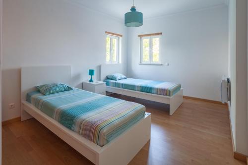Cama ou camas em um quarto em Miramar