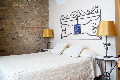 Ένα ή περισσότερα κρεβάτια σε δωμάτιο στο Marulivo Hotel