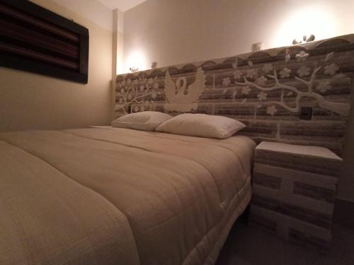 Hotel Kachi de Uyuni房間的床