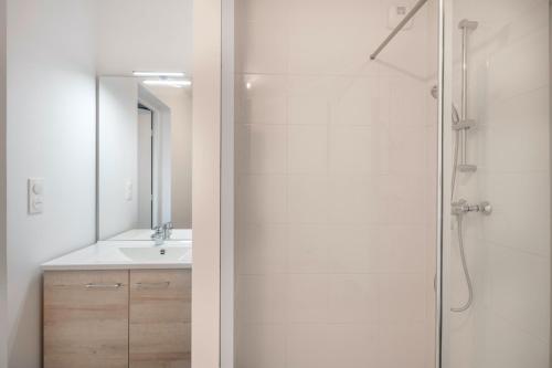 Koupelna v ubytování Face à la mer, bel appartement pour 8